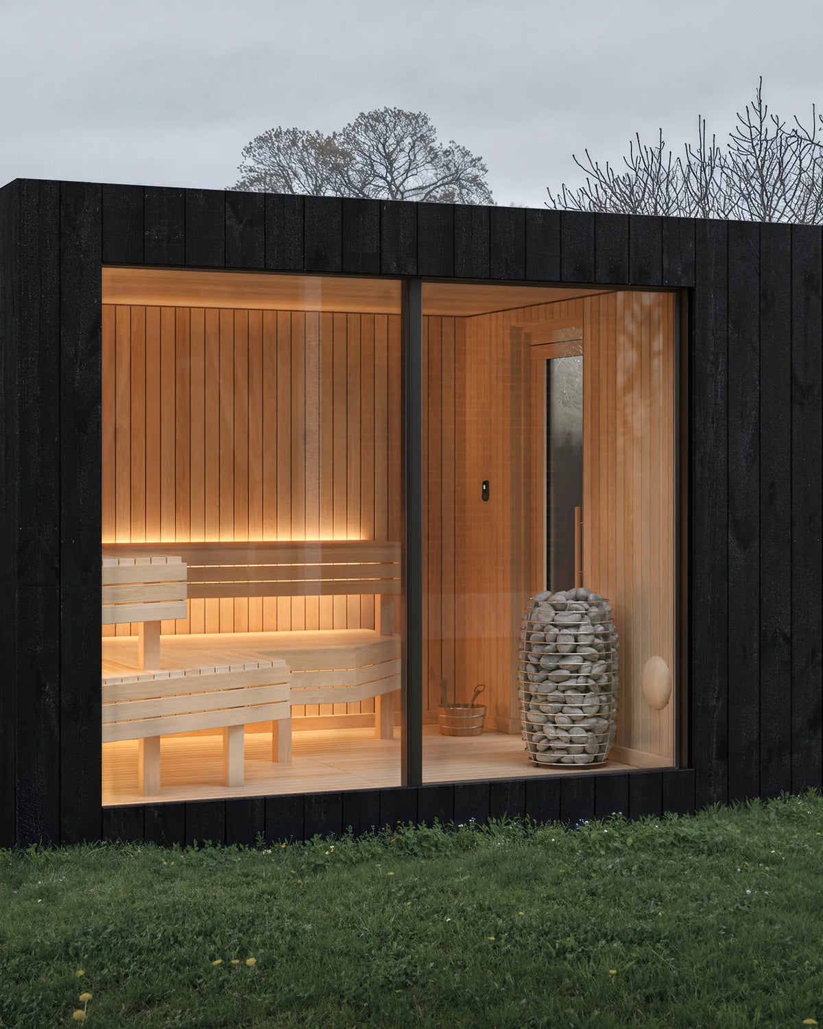 Visualisation of the NOOK Sauna from the garden, the lit room behind the glass